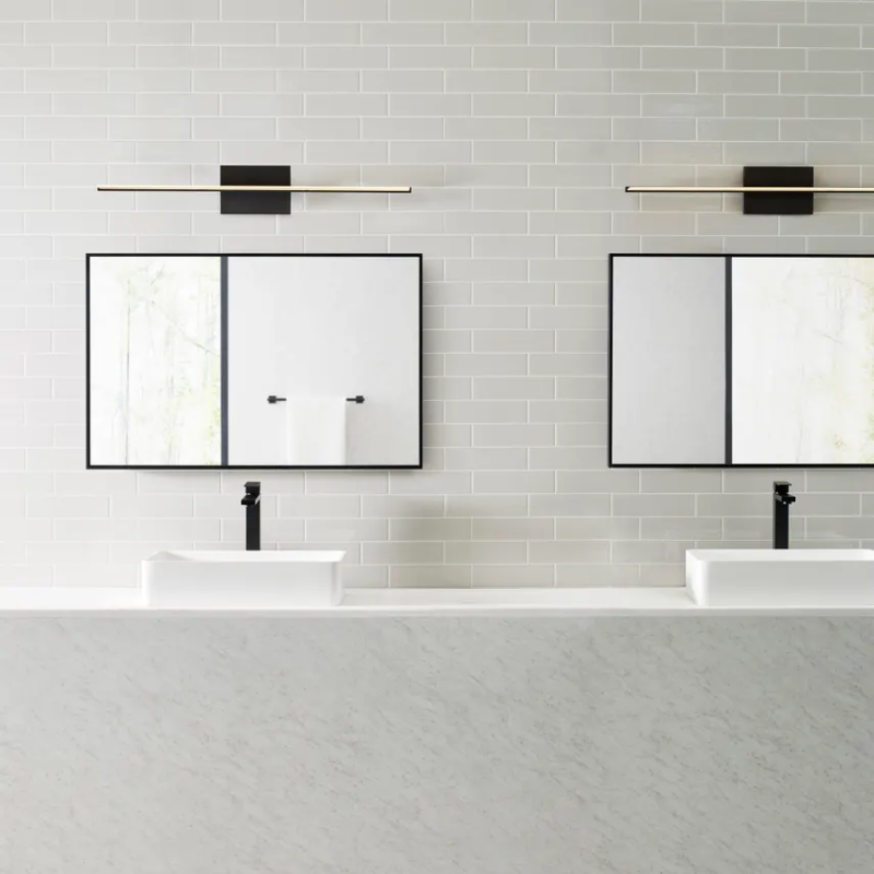 The Span Vanity Light from Visual Comfort & Co. in a jack and jill bathroom.