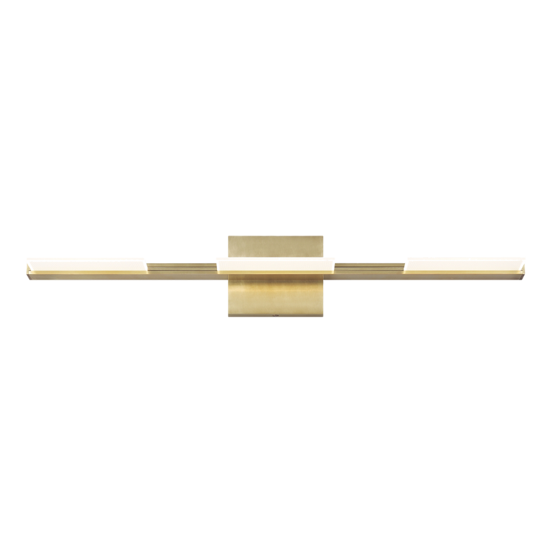 The Tris 3-Light Bathroom Sconce from Visual Comfort and Co in aged brass, angled.