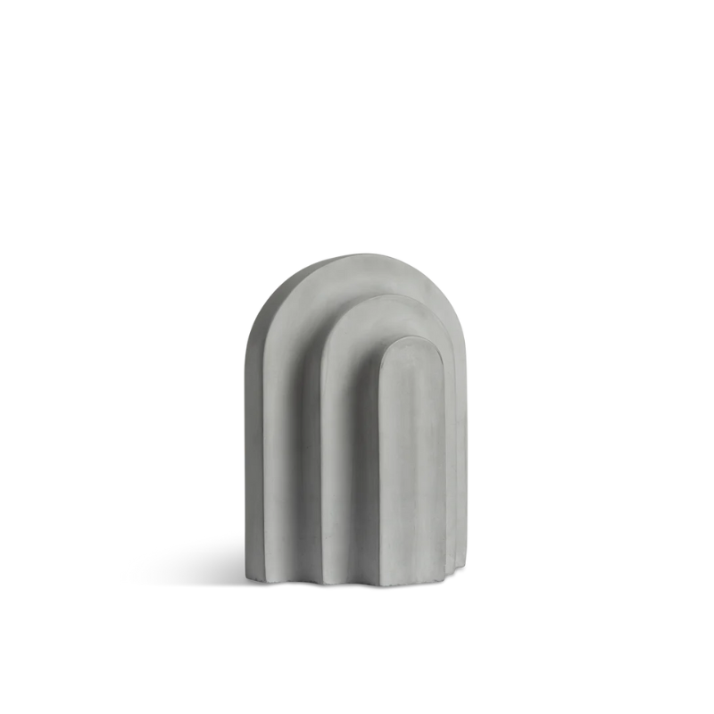 Together with a row of books Arkiv forms a small graphic ensemble of arches and blocks. Inspired by the function and aesthetic of the classic architectural arches and columns. With its vivid shape, the bookend catches the light and throws harmonious shadows revealing a fascinating and delightful piece to the eye. Lean your favourite books against Arkiv, lay it horizontal to function as a paper press or use it as a decorative piece of art.
