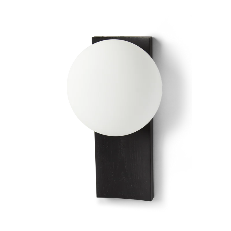 With its portable character, the versatile piece functions as a dynamic table and wall lamp. At the same time, its dimmable feature allows you to change the mood and intensity of the light to suit the specific setting. Place it on a desk, use the tray for your pieces of jewelry or hang it on the wall to provide an inviting light with no need for an electrical supply.