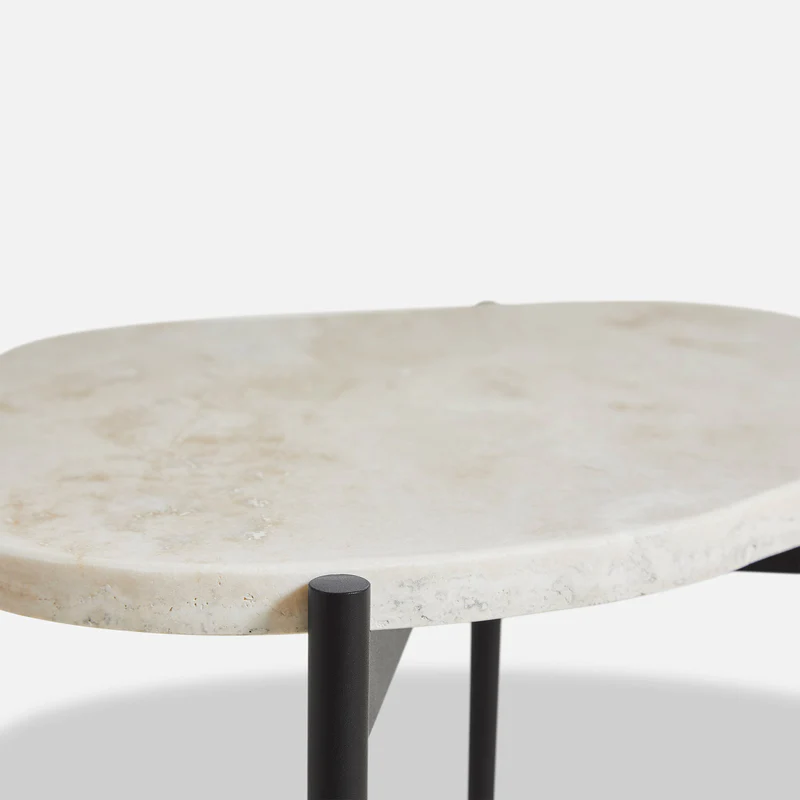 A close up on the Ivory La Terra Occasional Table from Woud.