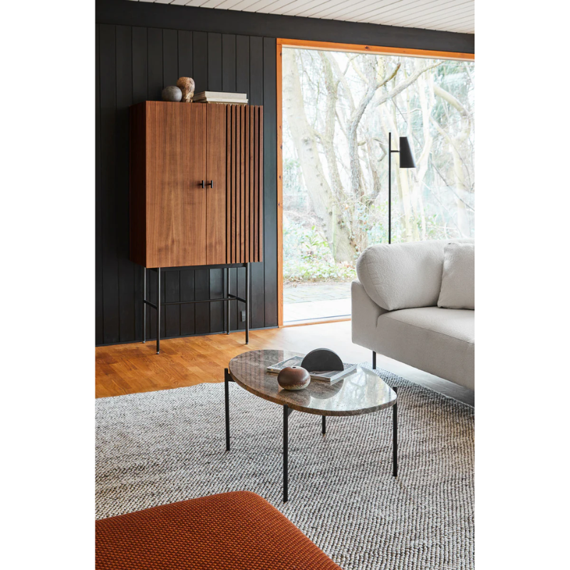 The Melange La Terra Occasional Table from Woud in a lounge area.