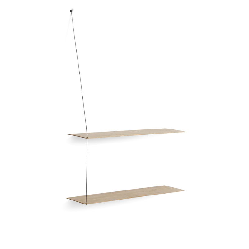 Stedge is all about lightness, purism and a clear structure. The subtle design is an optical illusion as the solid shelves seem to hang by a thread. With its light expression and fine edges, Stedge will be a perfect match for any room. Extend the shelving system with more shelves and choose either a long or short top wire to make it a perfect fit on your wall. Available in two widths.