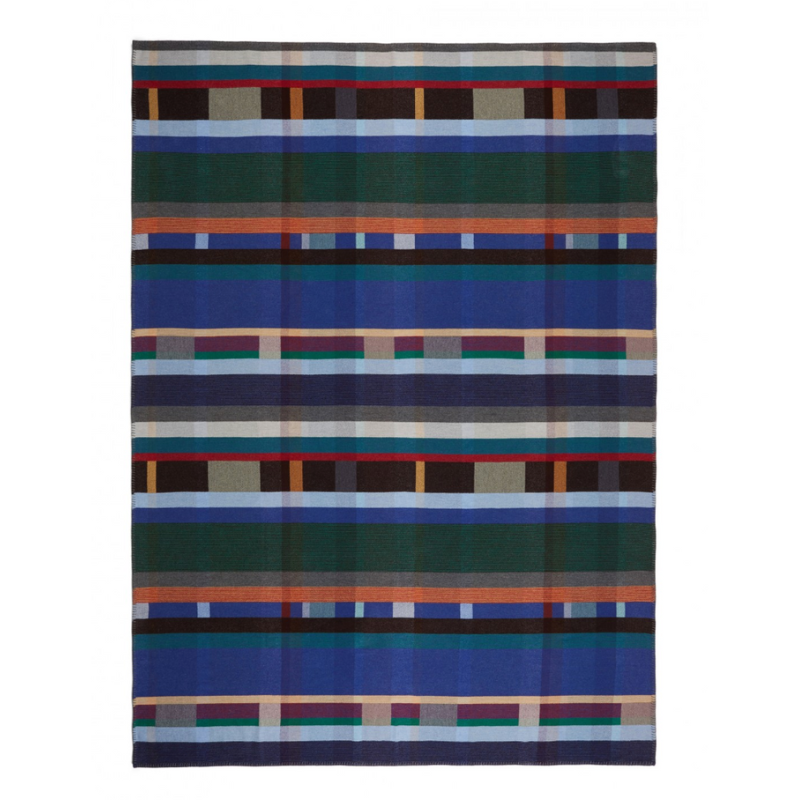 The Antoni Throw from the Wallace & Sewell Block Throw Collection is inspired by Korean artist, Chung Eun Mo's abstract paintings. This stunning throw features a bold checkerboard pattern of juxtaposed blocks and striking hues. Made from sumptuous merino lambswool and finished with blanket stitches for added elegance, the Antoni Throw is reversible with a different colorway on each side.