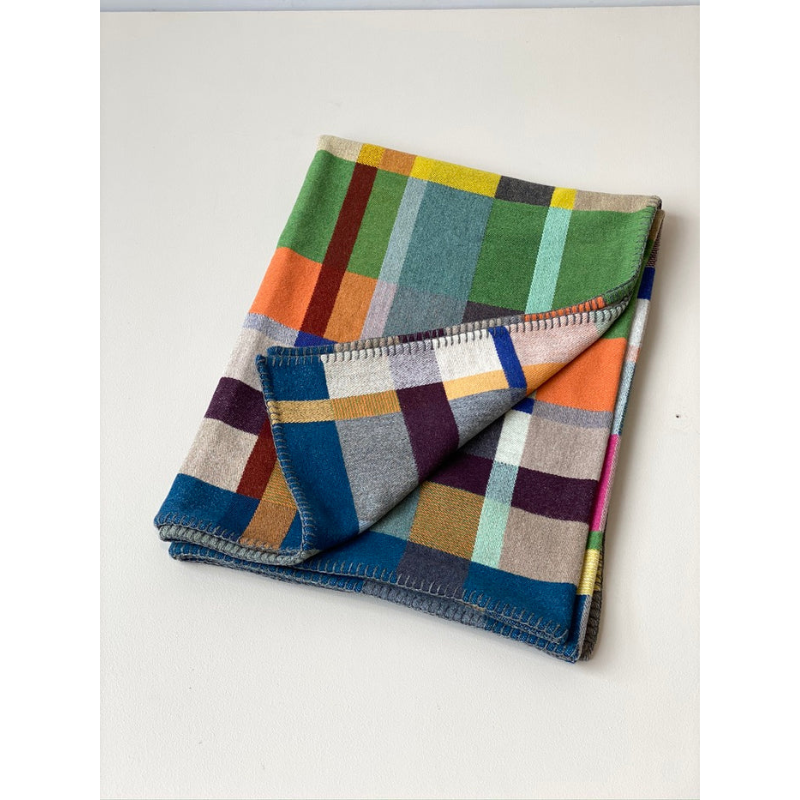 The Gwynne Block Throw from Wallace & Sewell made from 100% merino wool.