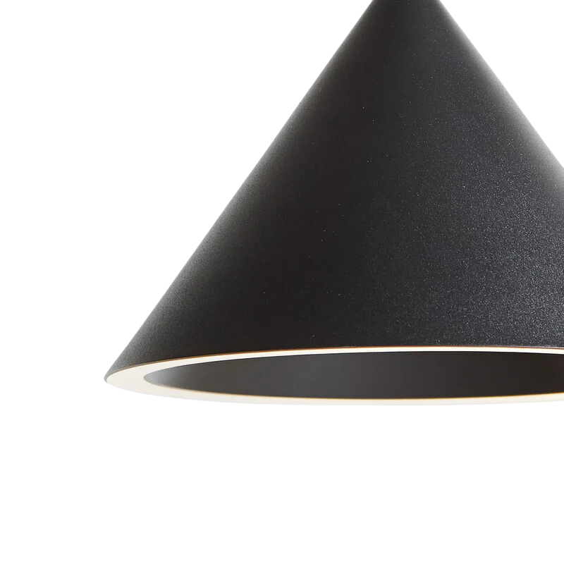 The Annular Pendant from Woud in a studio close up.