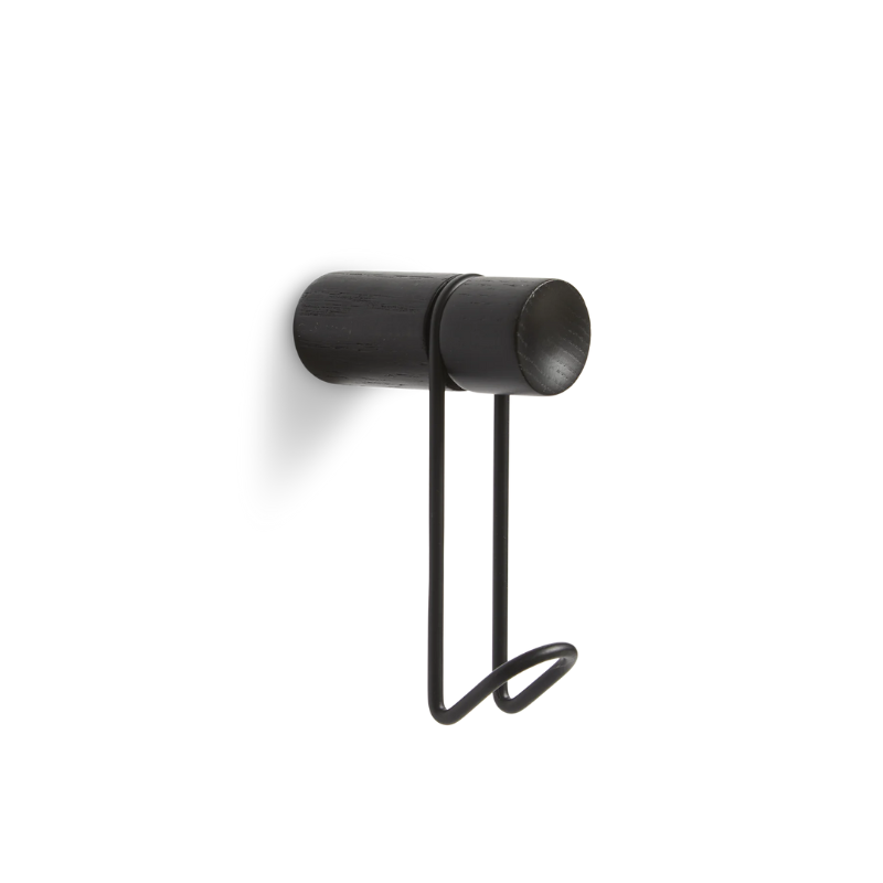 The Around Wall Hanger (Small) from Woud in black with the black hook.