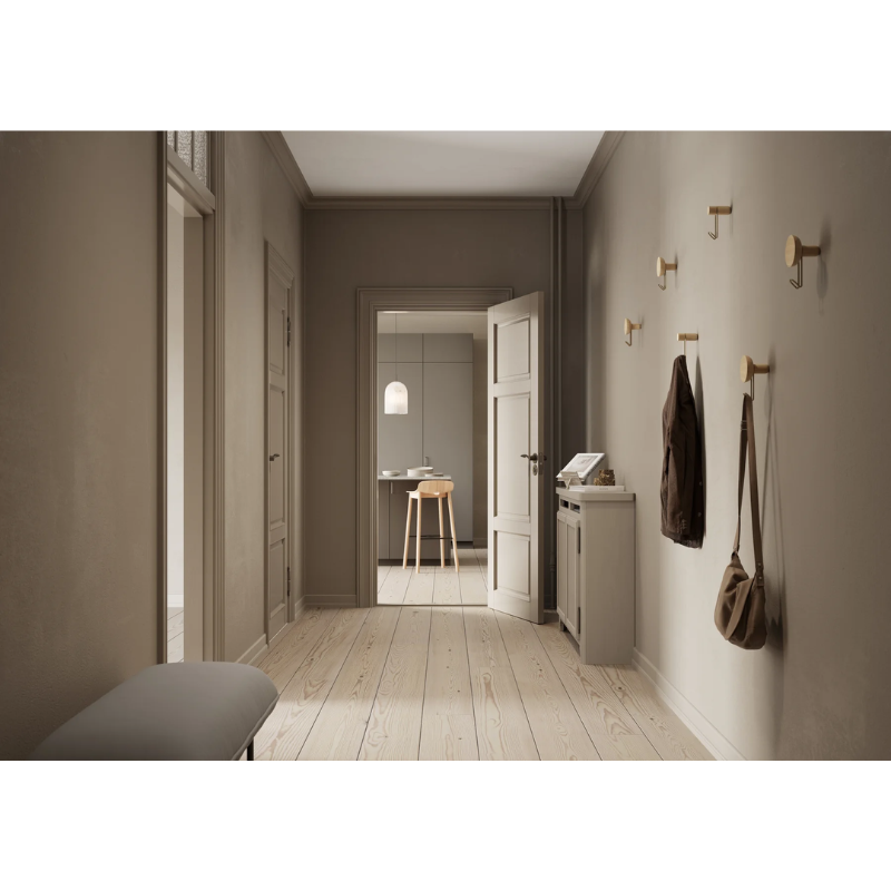 The Around Wall Hanger (Small) from Woud in a hallway.