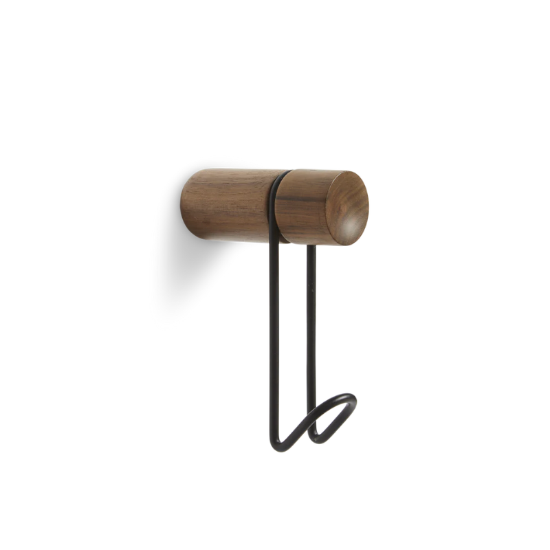 The Around Wall Hanger (Small) from Woud in walnut with the black hook.