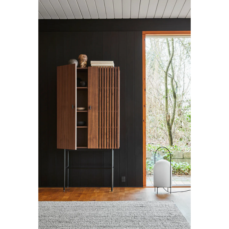 The Array Highboard from Woud in walnut, opened.