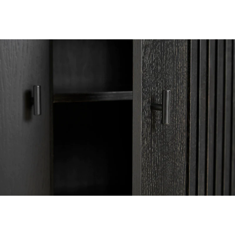 A close up shot of the black Array Sideboard's handle and door.