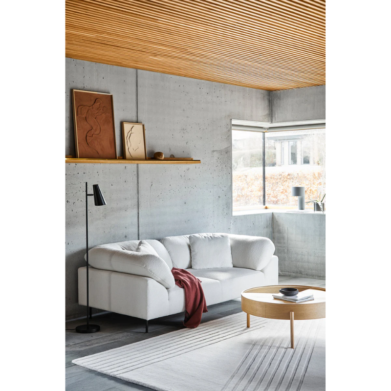 The Collar 2 Seater from Woud in a lounge.