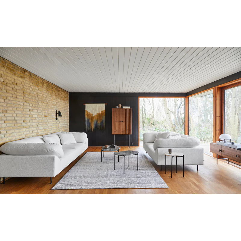 The Collar 3 Seater from Woud in a family space. all-groups