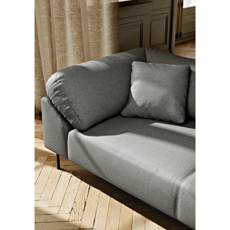 The Collar Open End Left (Arm Right) from Woud in a lifestyle photograph showing the upholstery. all-groups