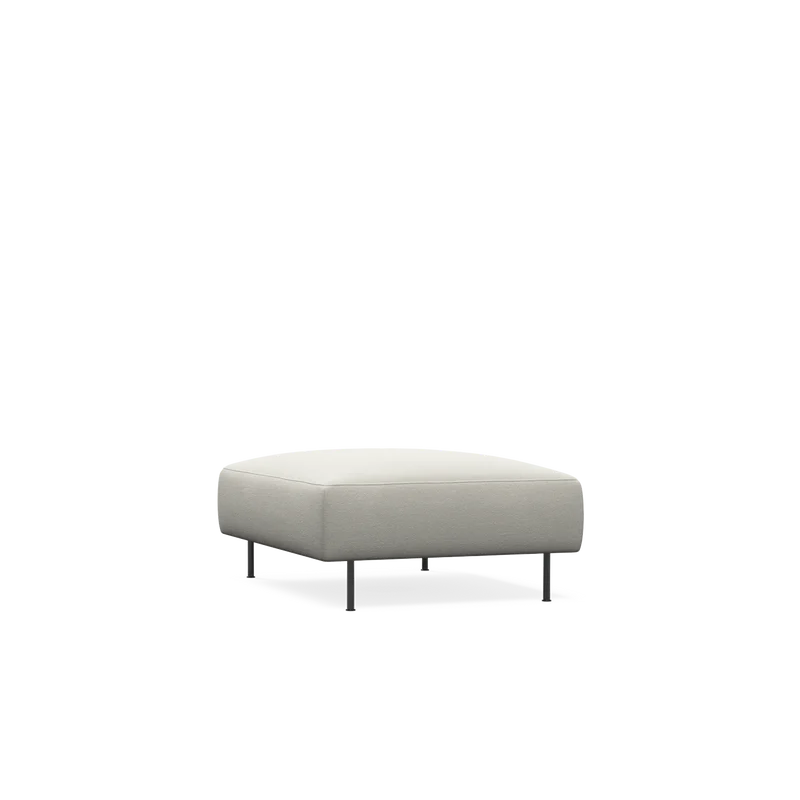 The Collar Ottoman from Woud in off white.