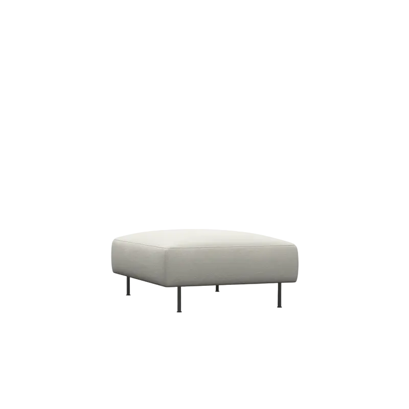 The Collar Ottoman from Woud in off white.