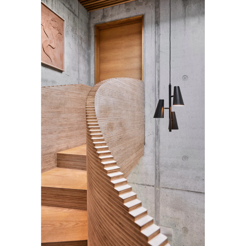 The Cono Pendant with 3 Shades from Woud in a home lifestyle photograph.