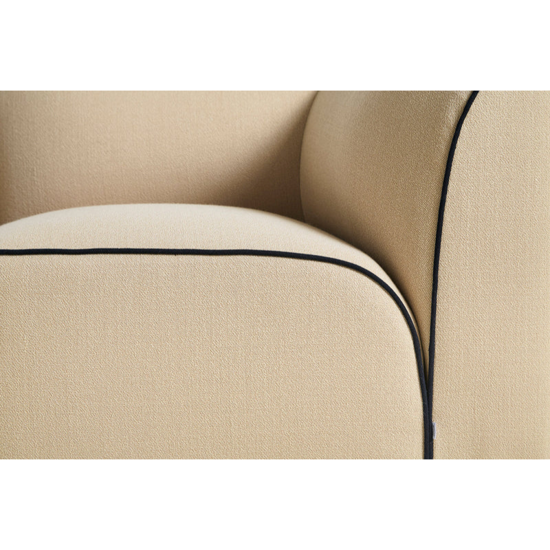 The Flora 2.5 Seater from Woud with KVADRAT Vidar 0323 fabric in a close up photograph.