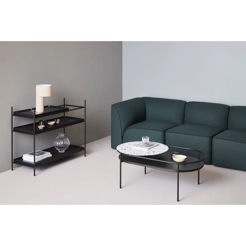 The Flora 2.5 Seater from Woud with custom fabric in a living room.