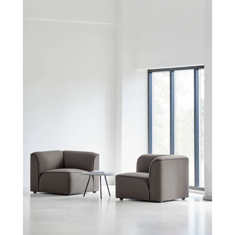 The Flora 2 Seater from Woud with custom fabric in a lounge.