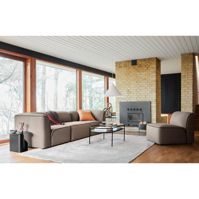 The Flora 3 Seater from Woud with custom fabric in a living room.