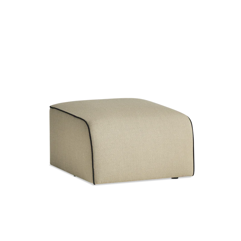 The Flora Pouf from Woud in KVADRAT Vidar 0323 fabric.