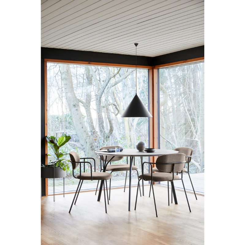 The Frame Dining Chair from Woud in a family area.