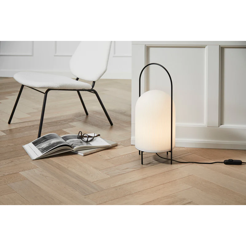 The Ghost Floor Lamp from Woud in a living room.