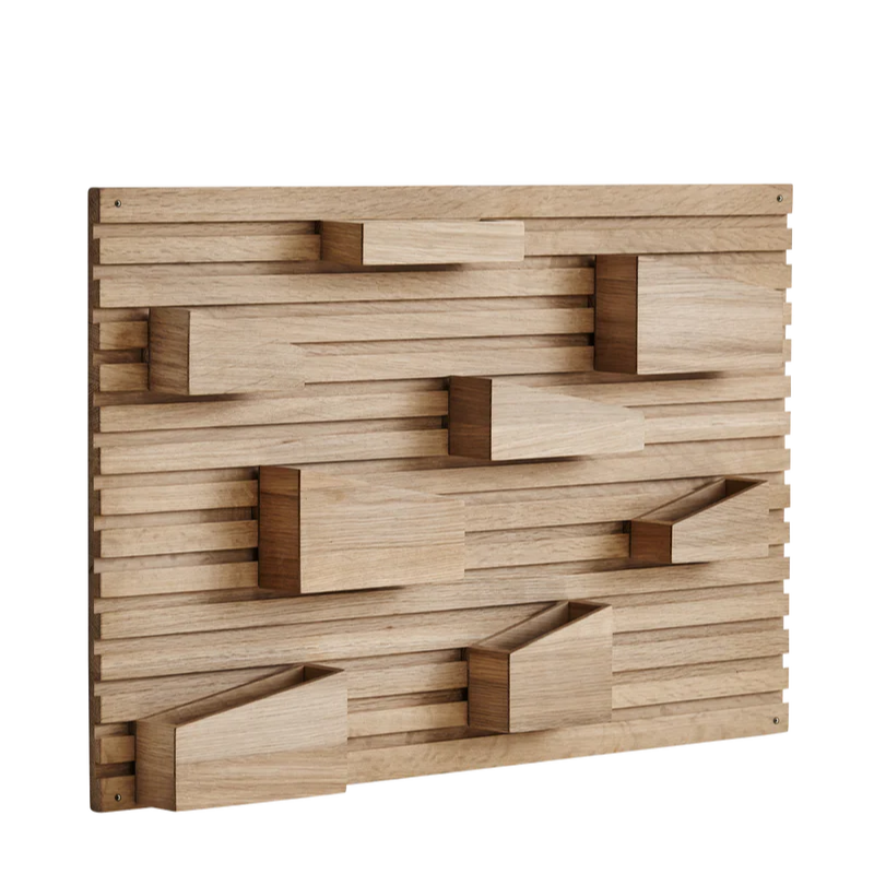 Input is a flexible organizer with eight movable boxes in different dimensions and shapes. Allowing you to create the exact expression you want, matching your needs and taste. The softness of the oak complements the graphic and angular lines of the organizer and pockets. The design is a perfect solution to organize small everyday essentials in the hallway, office, or bedroom.