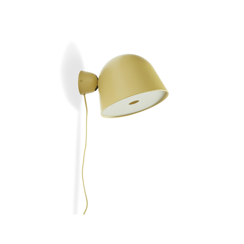 The Kuppi Wall Lamp 2.0 from Woud in mustard yellow.
