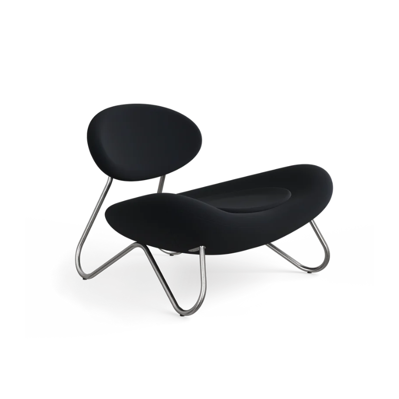 The Meadow Lounge Chair from Woud with black fabric and brushed steel legs.