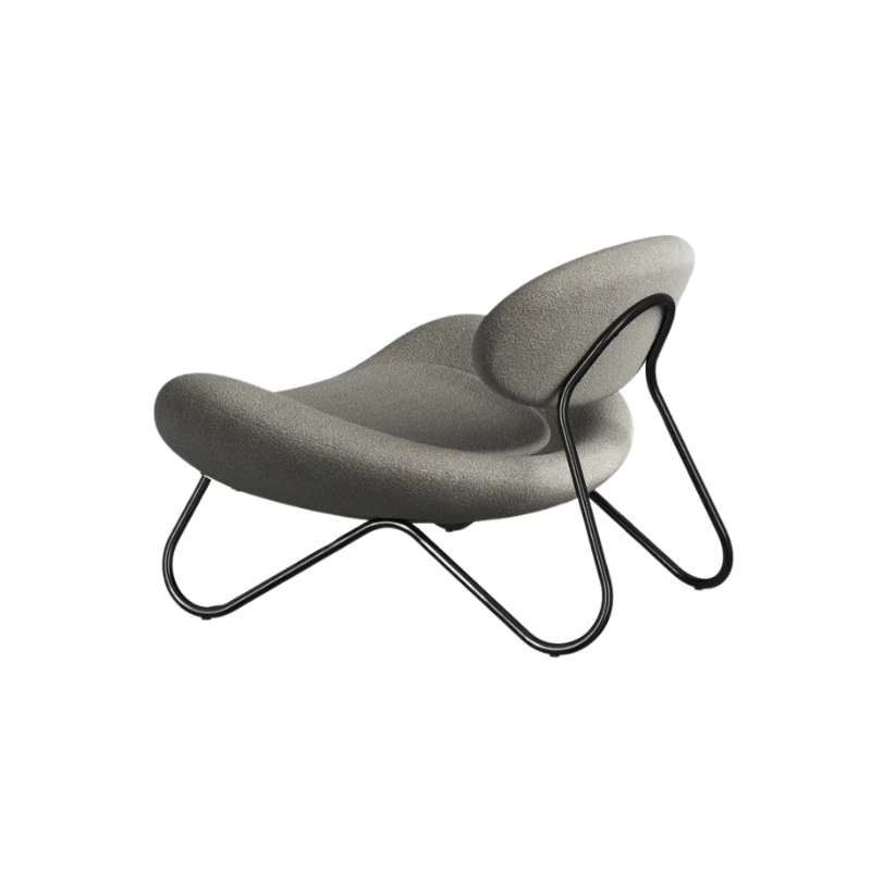 The Meadow Lounge Chair from Woud with warm grey fabric and black legs.