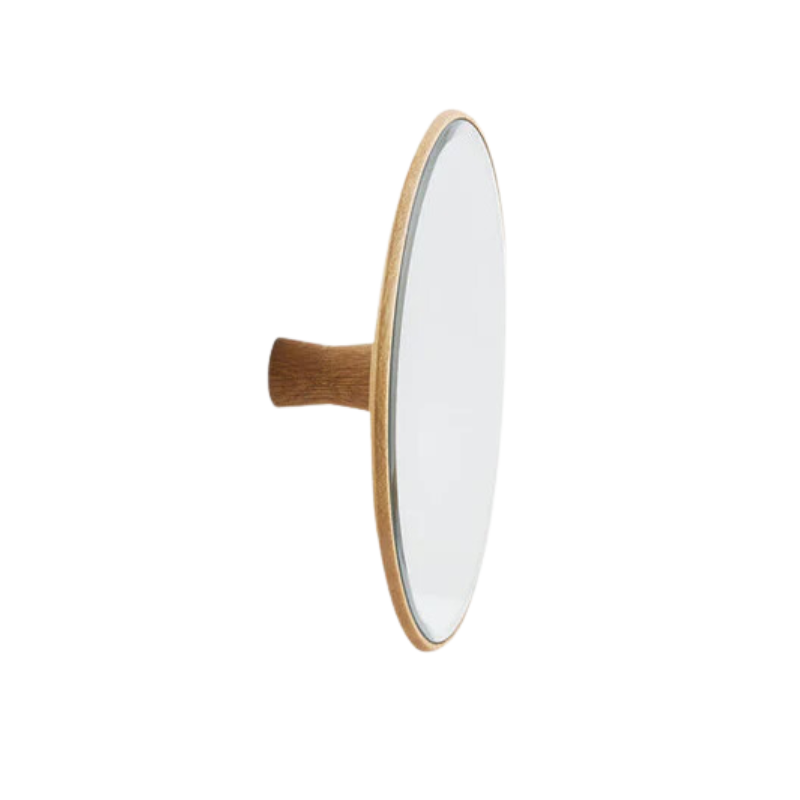 The Mirror Barb from Woud wall mounted.