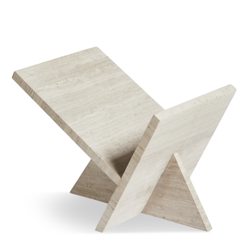 The Mountain Magazine Holder from Woud, made using solid travertine.