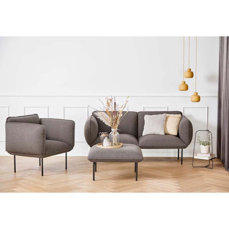 The Nakki 2 Seater from Woud with a custom fabric in a family space.