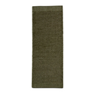 The Rombo Rug from Woud in moss green and 75 by 200 cm size.