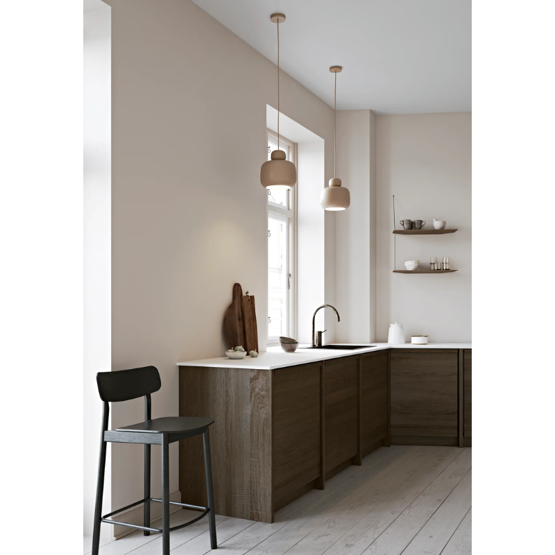 The Soma Counter Chair from Woud in a living area lifestyle photograph.