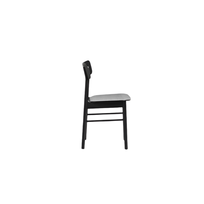 The Soma Dining Chair from Woud in Black with a side angle shot.