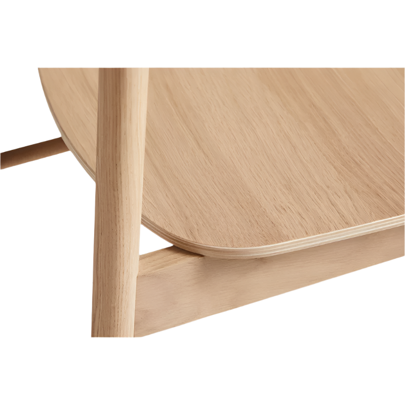 The Soma Dining Chair from Woud in White Pigmented Oak with a close up on the seat.