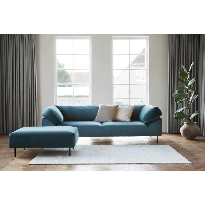 A Tact Rug from Woud in a living room space.