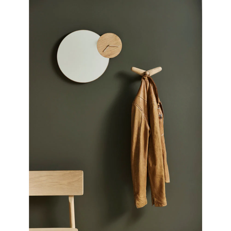 The Tail Wing Hook from Woud in an entryway lifestyle photograph.