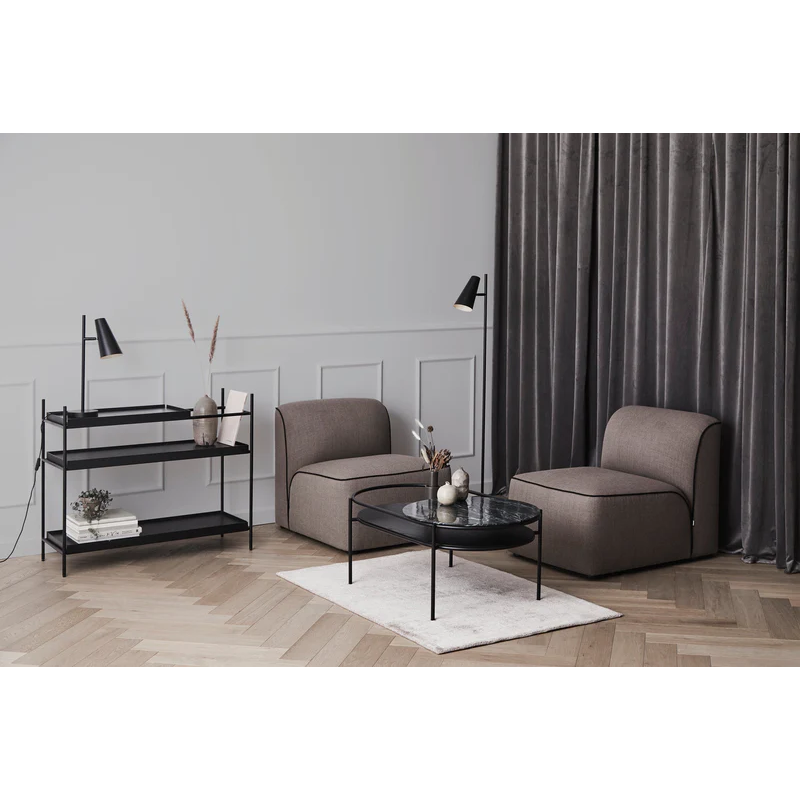 The Tint Rug from Woud in a living room.