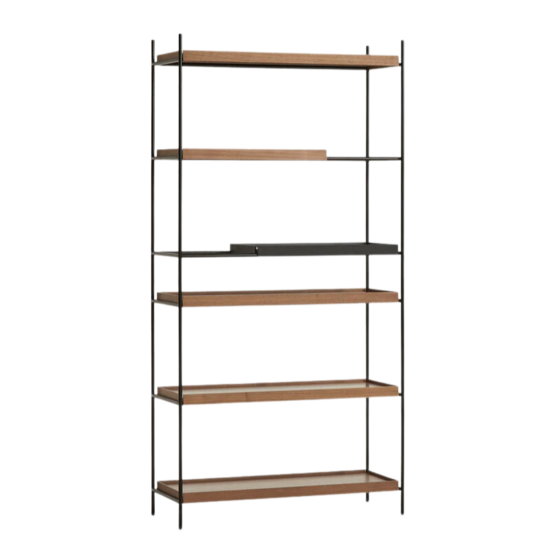 The Tray Shelf (high) from Woud in walnut with four long walnut trays, one short walnut tray, and one short black tray.