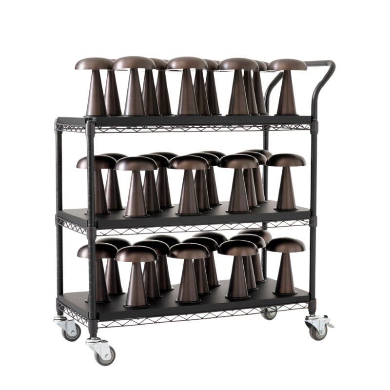 The Como SC53 from &Tradition in bronzed on a rack of dozens of lights, perfect for hospitality.