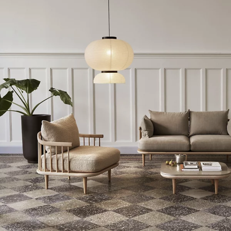 The Formakami JH5 Pendant Light from &Tradition in a living room.