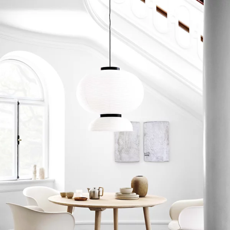 The Formakami JH5 Pendant Light from &Tradition in a lounge.