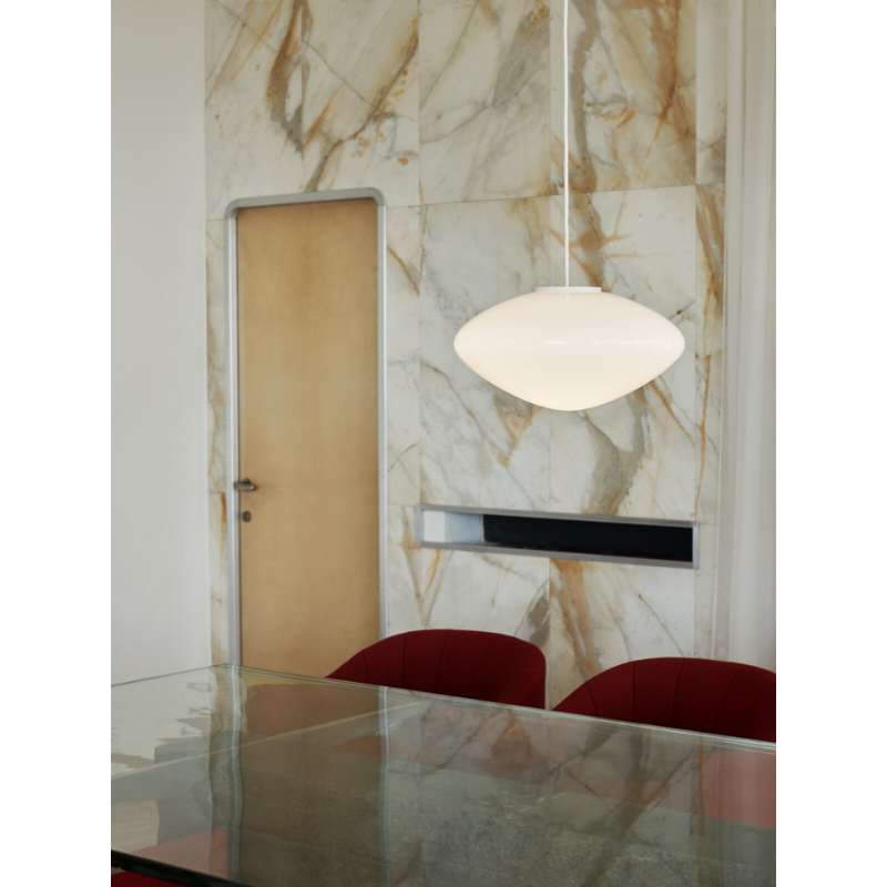 The Mist Pendant from &Tradition in an office.