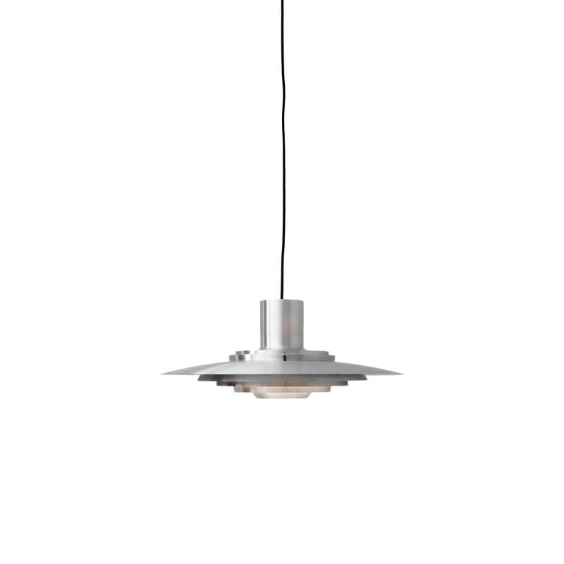 The P376 pendant lamp is a perfect example of subtle architectural slant on design. Originally conceived in 1963 by Danish architects Kastholm & Fabricius and relaunched by &Tradition in 2019, the P376 features five concentric shades that create gradations of curves towards the middle of the lamp to emit a soft, diffused light. The discrete placement of the shades and the silky aluminium finish culminate in a cohesive expression that’s both iconic and enthralling.