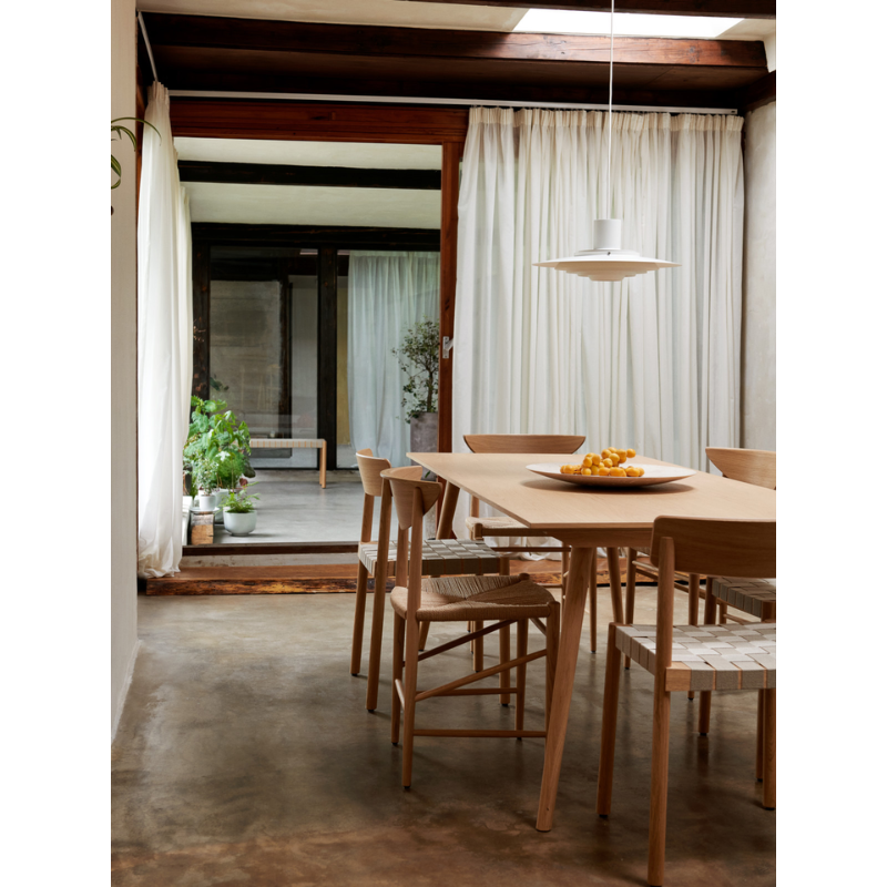 The P376 Pendant Light from &Tradition in a dining room.