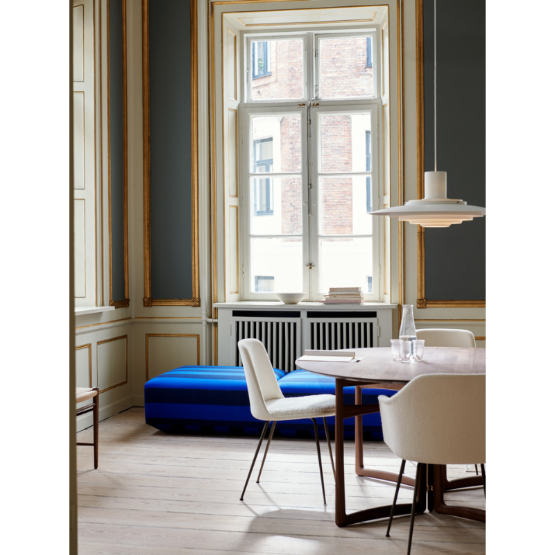 The P376 Pendant Light from &Tradition in a lounge area.